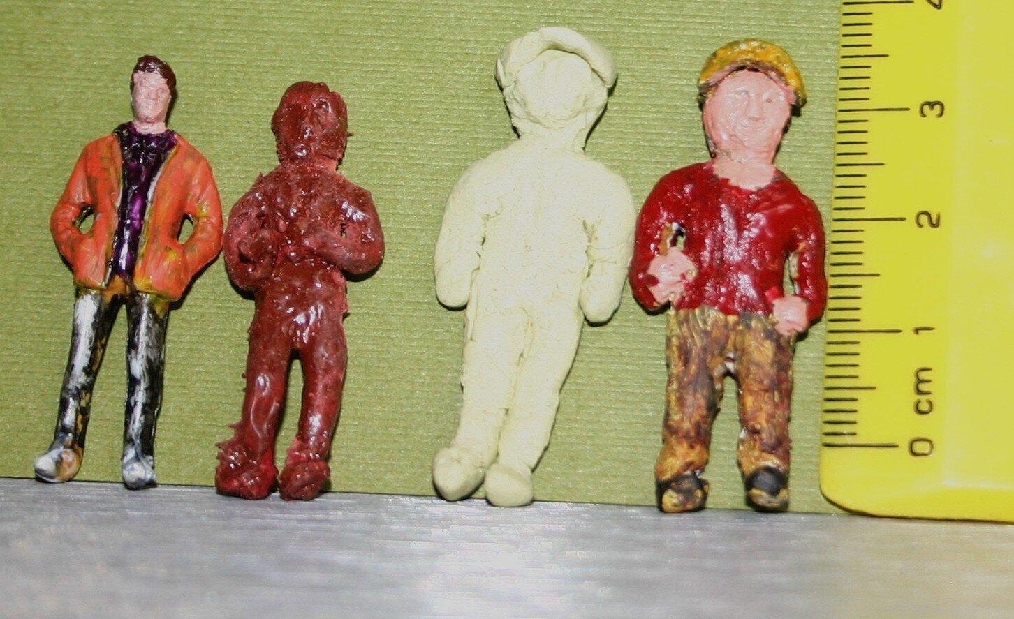 Comparison of techniques - store-bought reference, air-dry clay attempts, epoxy putty experiments