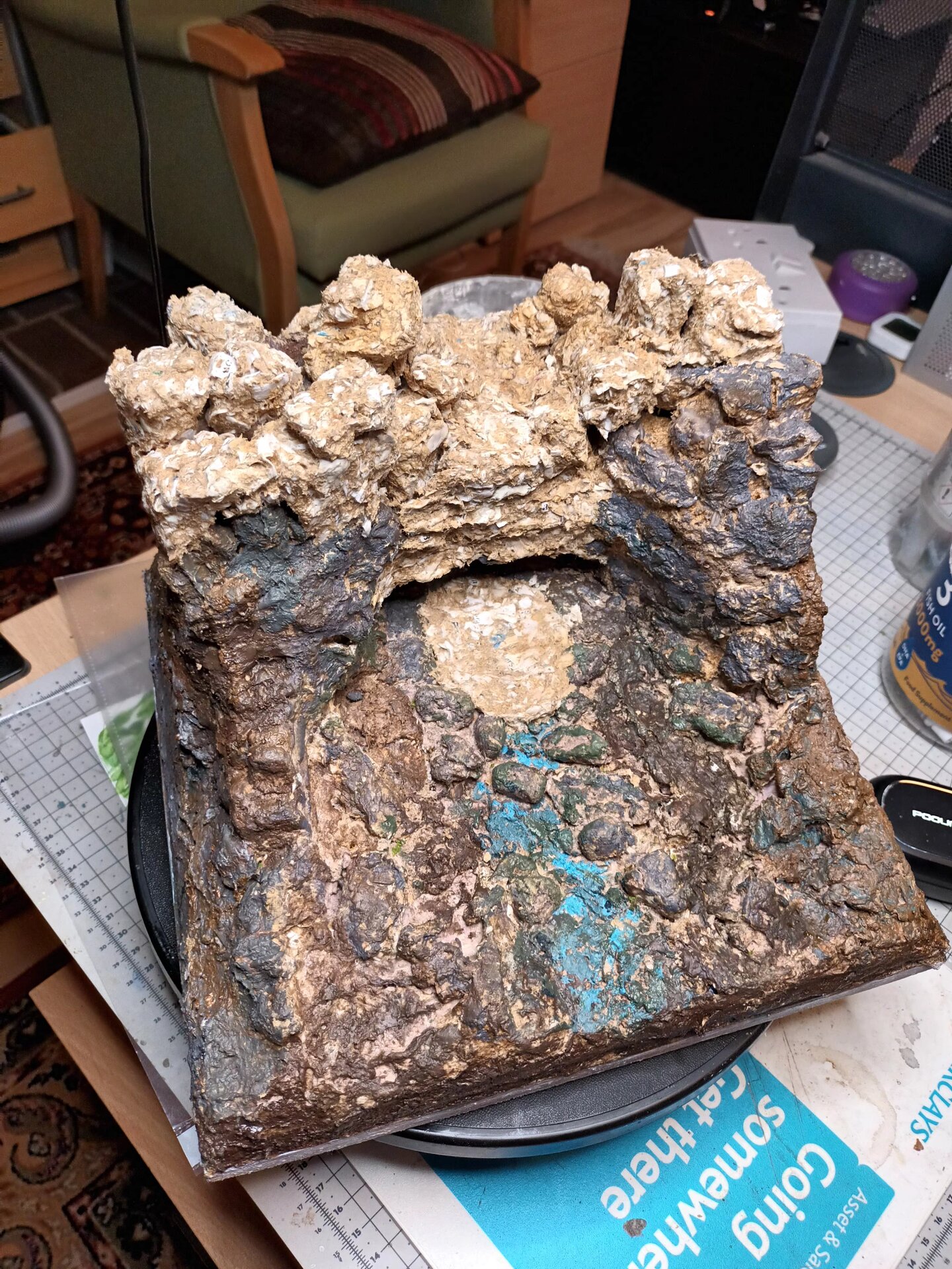 Overall rock cliff structure showing multiple features