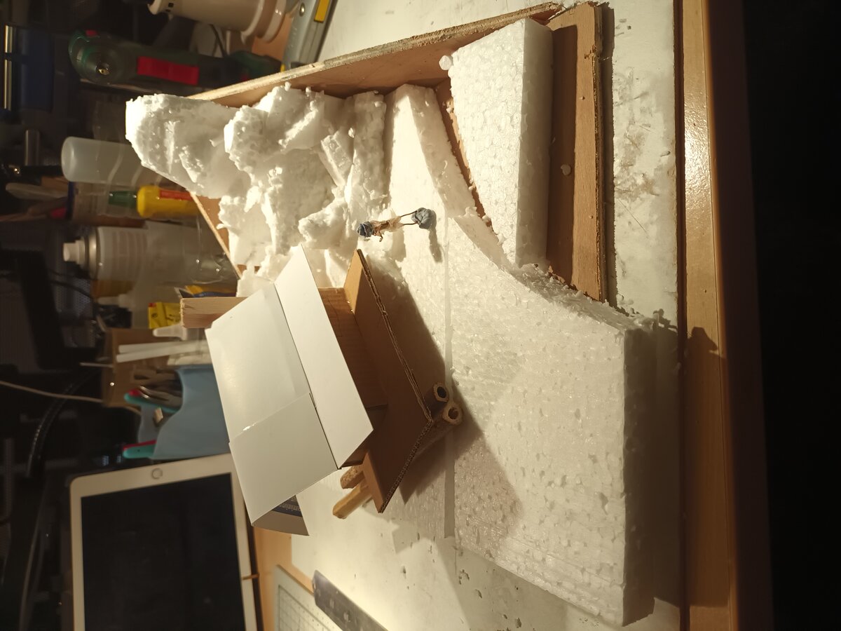 Prototype cabin with rocky backdrop